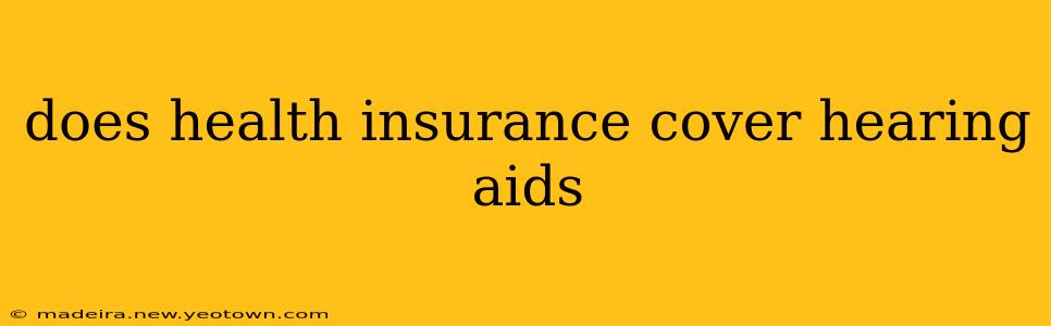 does health insurance cover hearing aids