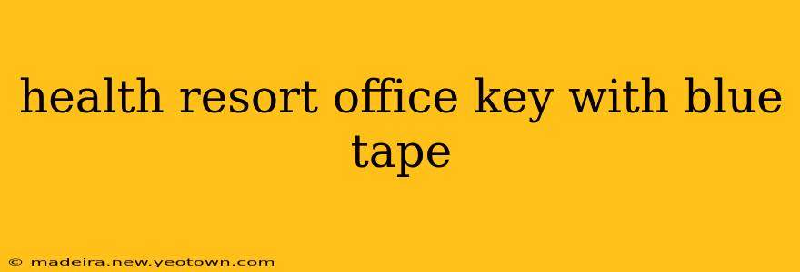 health resort office key with blue tape